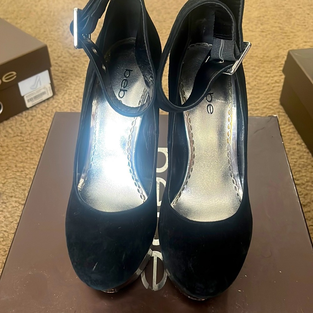 Bebe black wedges